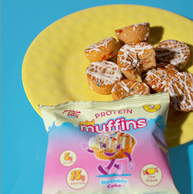 Delicious Birthday Cake Mini Muffins from Prime Bites, featuring 15g protein and a fun snack for celebrations.