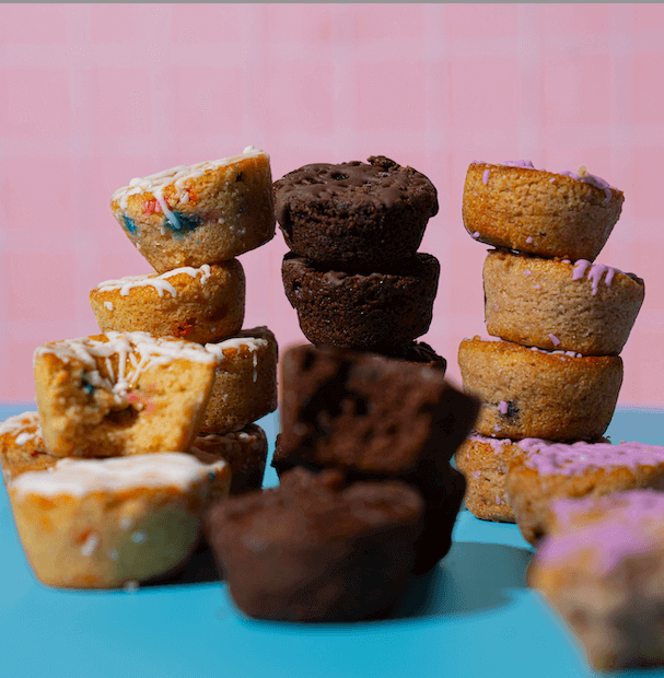 Mini Muffin Variety Pack from Prime Bites, featuring chocolate fudge, blueberry, and birthday cake flavors.