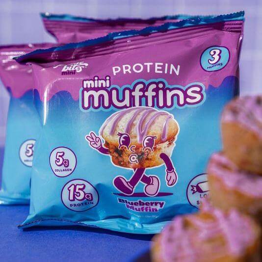 Prime Bites Blueberry Mini Muffins packaging with 15g protein and 5g collagen for guilt-free indulgence.