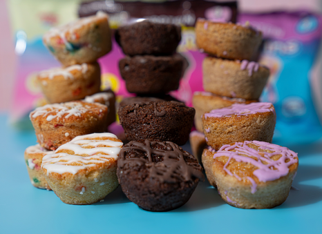 Variety of Prime Bites protein mini muffin packages